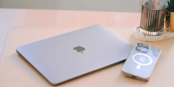 A laptop computer sitting on top of a table